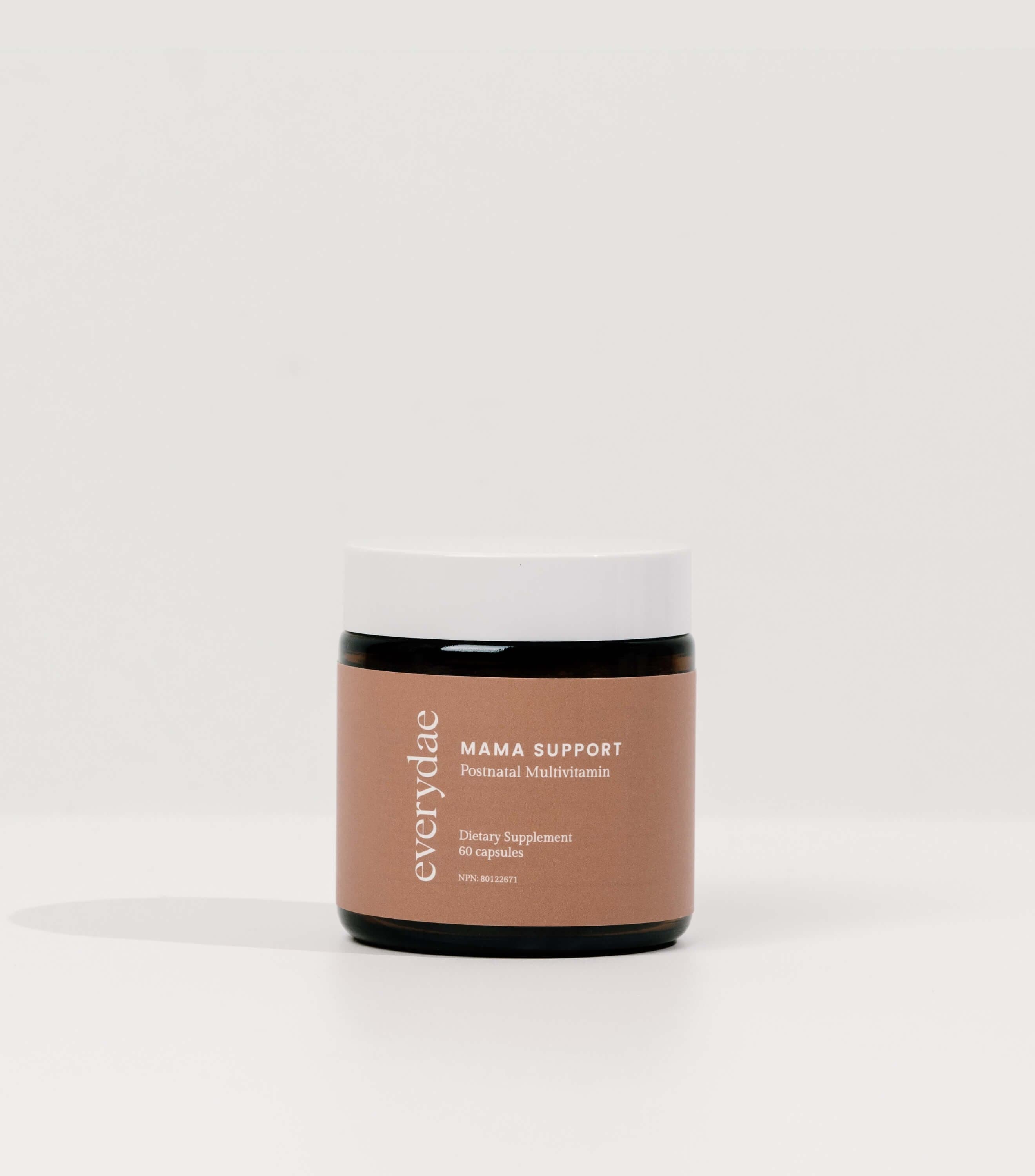 Everydae Mama Support postnatal multivitamin in a dark amber jar with a white screw lid and a rose label reading 60 capsules