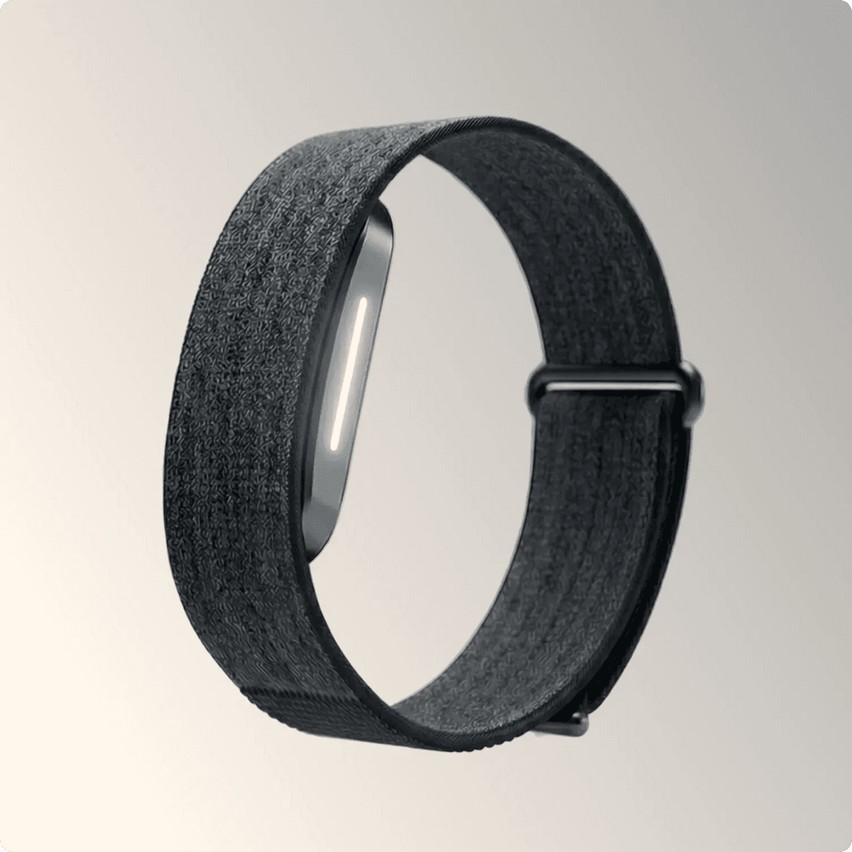 Hume Band 2.0 screenless wrist wearable with a black knit strap, a dark sensor pod with a white light bar, and a strap loop