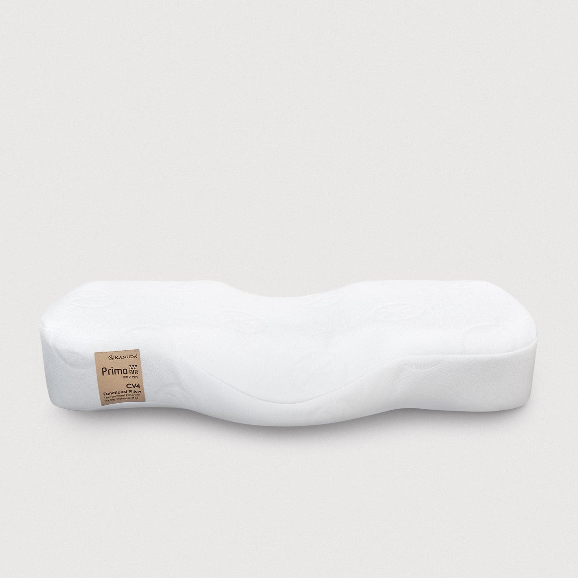 Kanuda USA orthopedic cervical pillow with a raised neck contour and a lower back-of-head section.