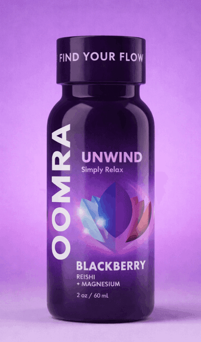 OOMRA Unwind 2 oz blackberry shot in a dark purple bottle and cap, standing upright with the front label facing, on a plain lilac background