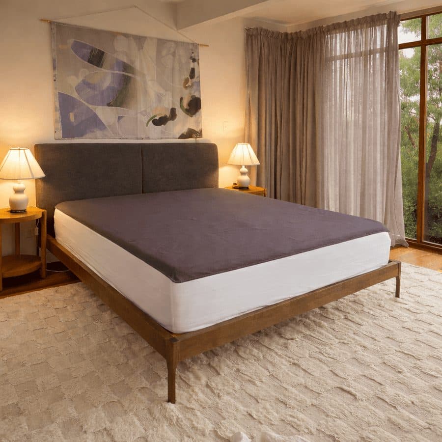 Premium Grounding sheet laid flat on a bed as an underlay