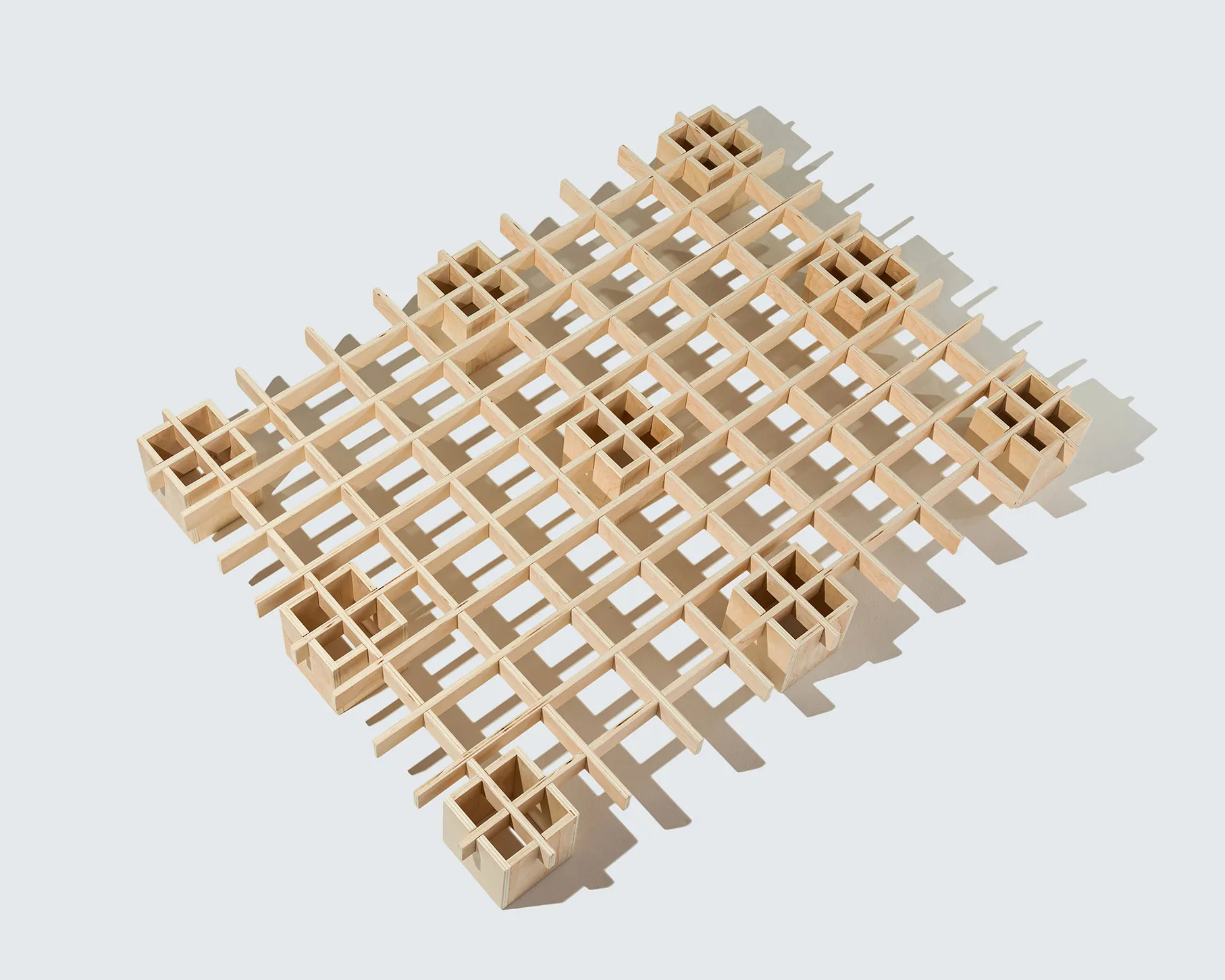 Tic Tac Toe interlocking platform bed frame by Quagga Designs