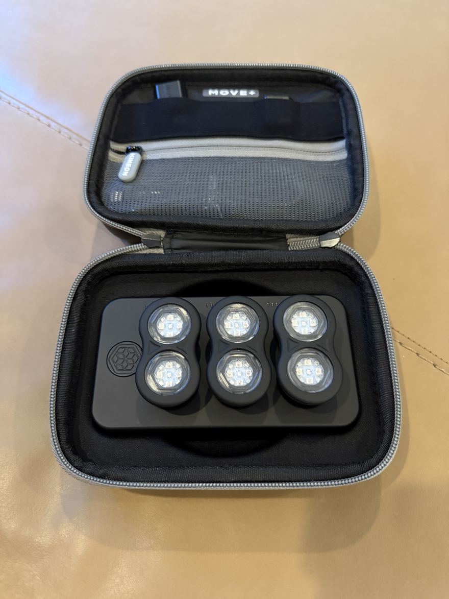 Inside the travel case: the three modules sit in the charge case, so putting it away and charging it are one step