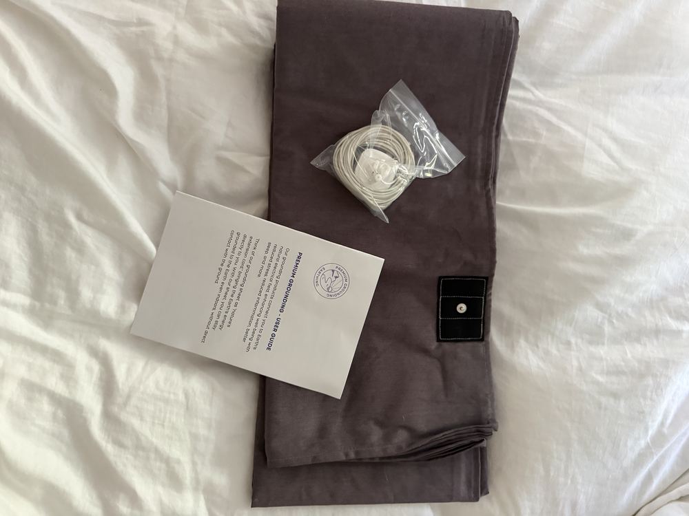 The Premium Grounding sheet as it arrived, with its grounding cord and user guide